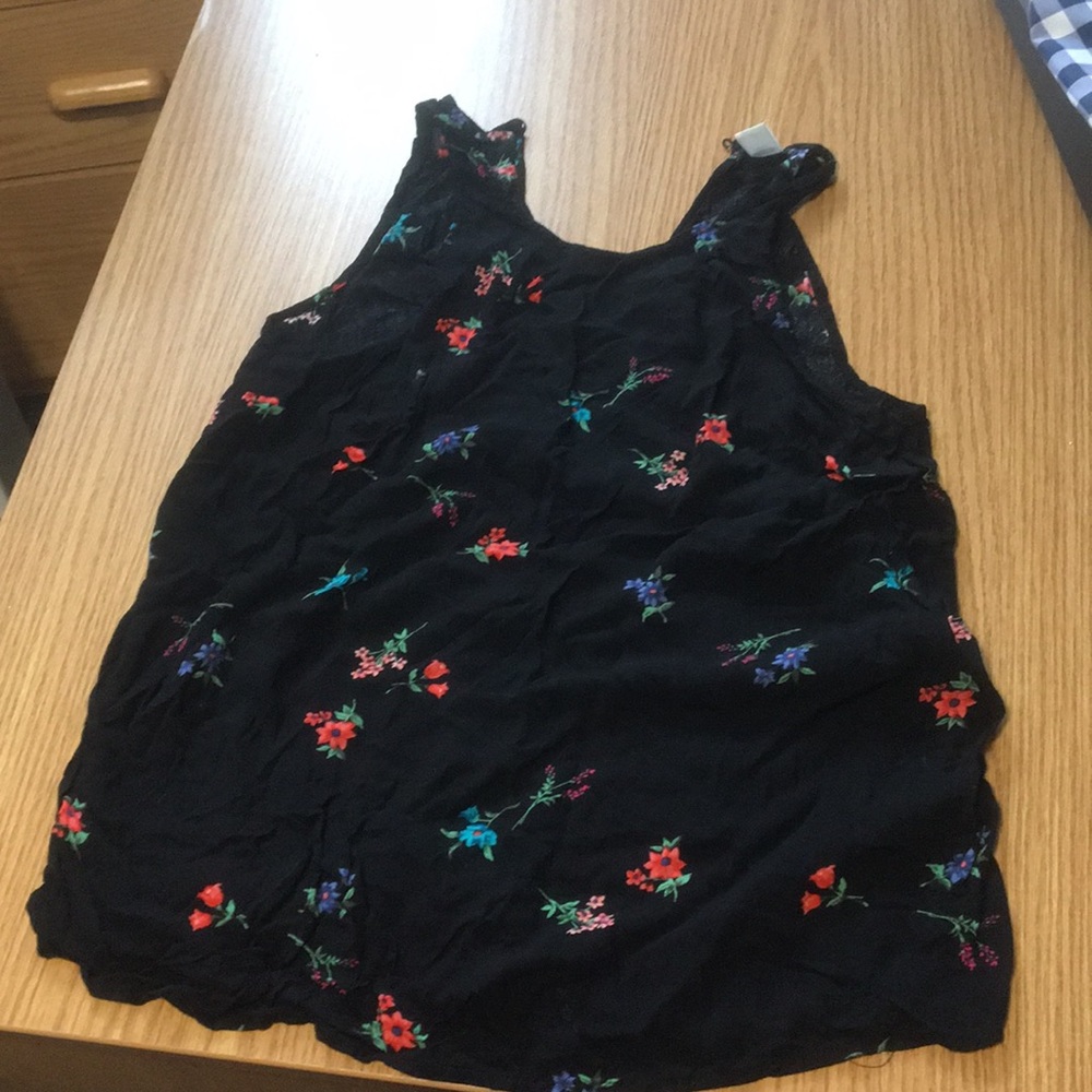 Black and floral tank top: brand is “Old Navy”
